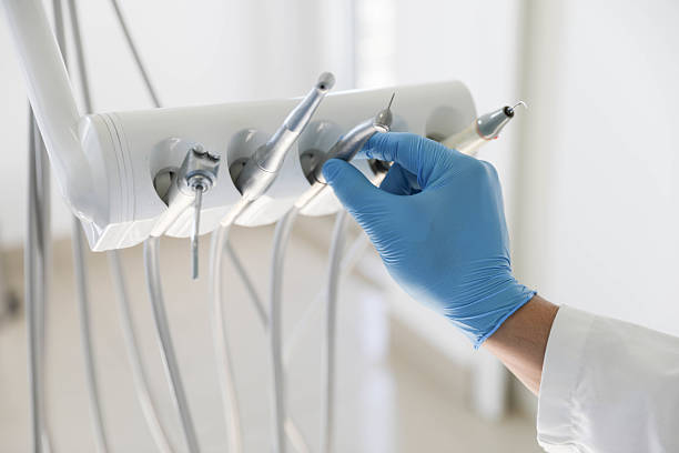 Professional Tooth Extraction technician working in Montgomery County County, AR